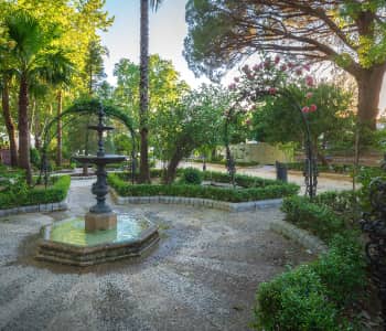 Residential landscaping with lush lawn and flower beds installed by Naturevalley
