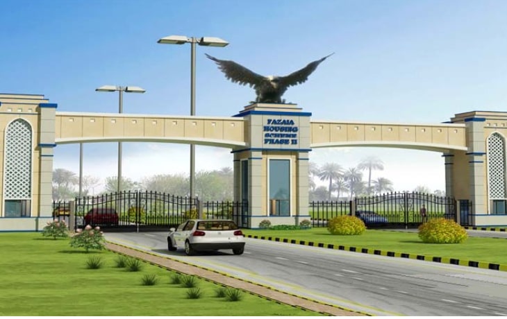 Society plantation project with tree-lined avenue in housing community by Naturevalley Lahore