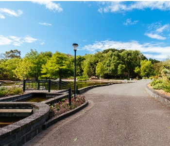 Society plantation park development with walking paths and gardens by Naturevalley